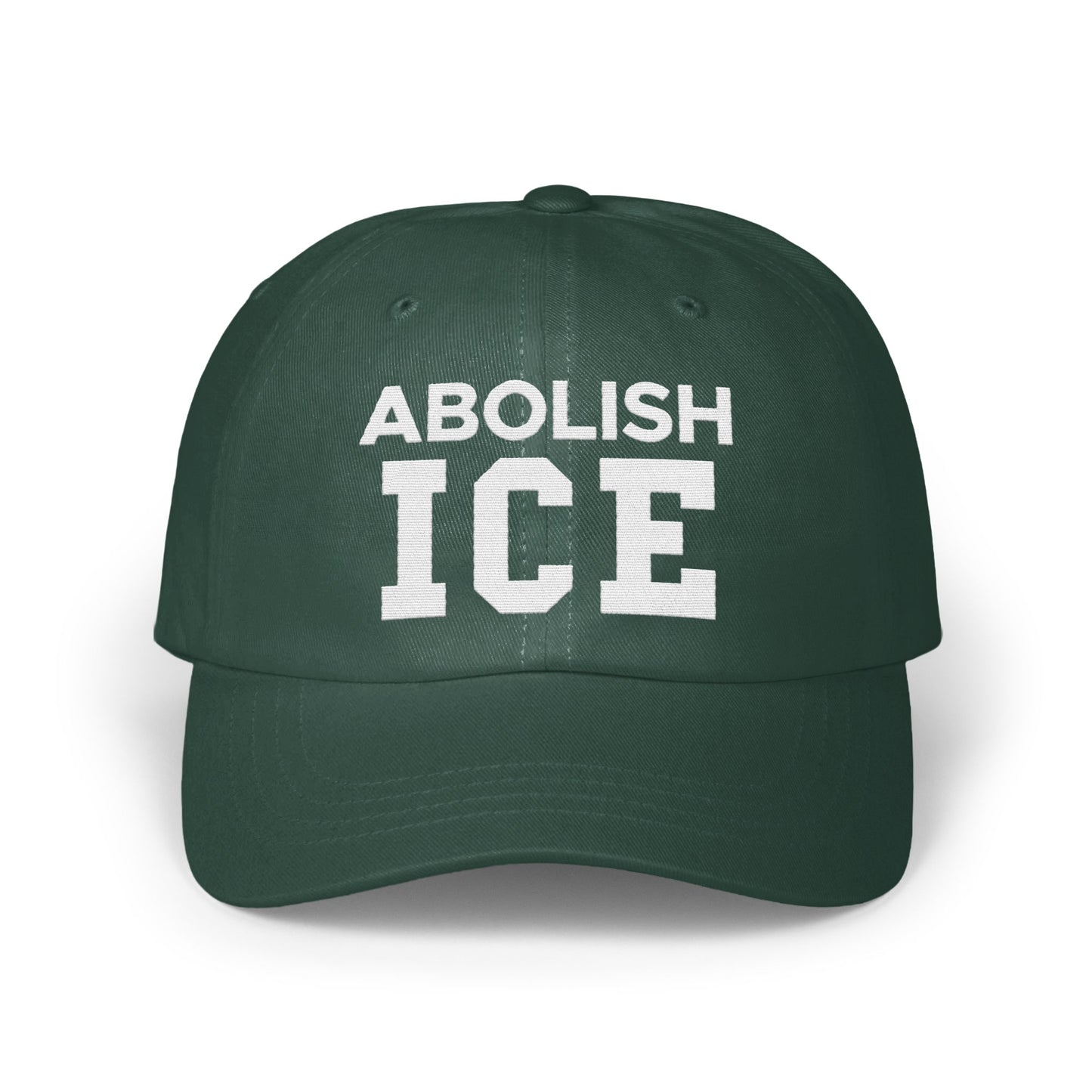 Abolish ICE statement on a dark green cap product